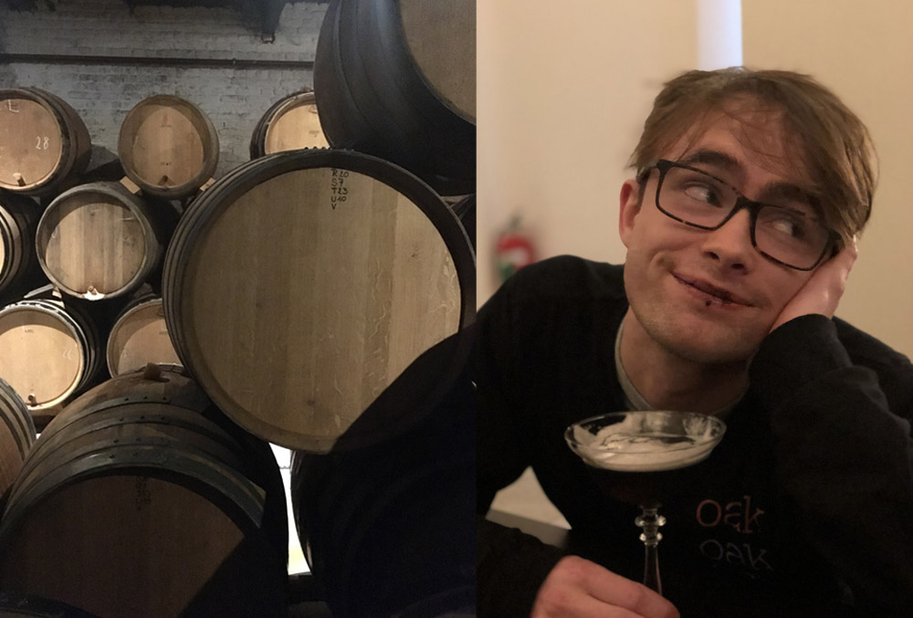 Daniel surrounded by barrels of beer